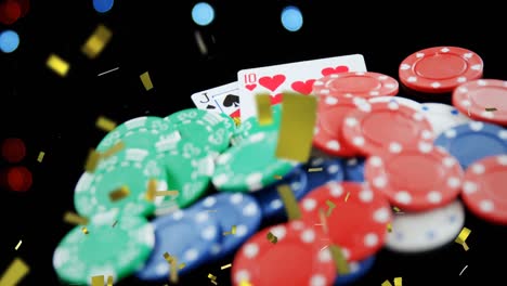Animation-of-confetti-falling-over-playing-cards-and-gambling-chips