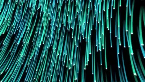 Green-and-blue-fibre-strands-moving-seamlessly-downwards-on-black-background