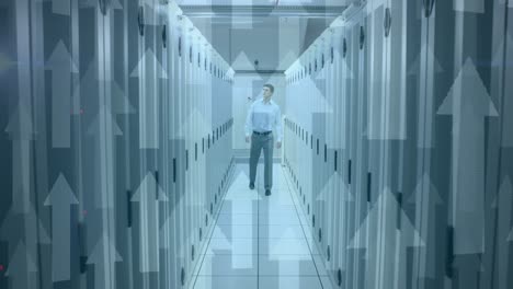 Animation-of-arrows-pointing-up-with-man-in-tech-room-with-computer-servers