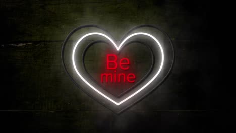 Animation-of-words-be-mine-in-red-with-white-and-yellow-concentric-neon-hearts-flashing-on-dark-wood