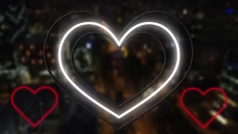 Animation-of-yellow-white-and-red-neon-hearts-flashing-on-blurred-background