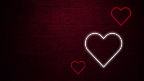 Animation-of-red-and-white-neon-hearts-flashing-on-dark-brick-wall