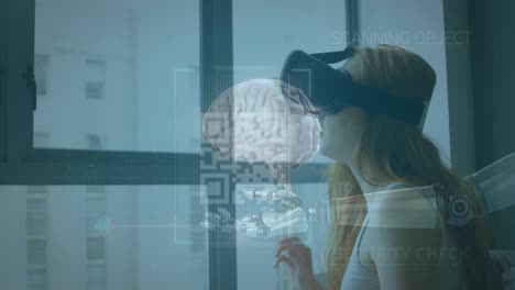 Animation-of-human-brain,-scope-over-robot's-arm-and-woman-wearing-vr-headset-in-background