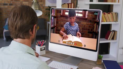 Caucasian-male-teacher-using-computer-on-video-call-with-schoolgirl