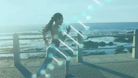 Animation-of-dna-strain-spinning-over-woman-jogging-on-promenade-by-the-sea