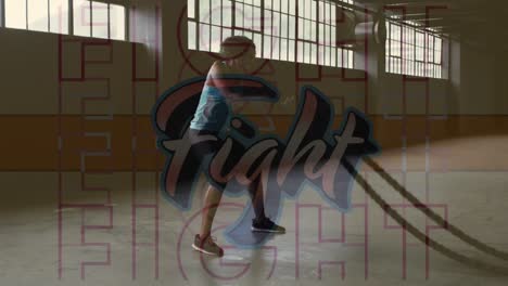 Digital-composite-video-of-fight-text-against-woman-training-with-battle-rope