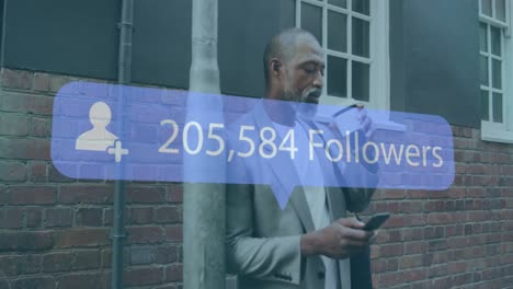 Animation-of-numbers-and-followers-text-on-banner-over-man-having-coffee-and-using-smartphone