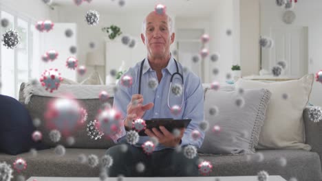 Animation-of-covid-19-cells-over-male-doctor-using-tablet-at-home
