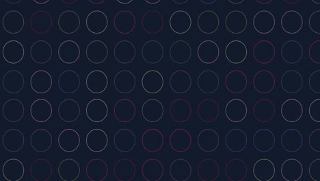 Digital-animation-of-multiple-colorful-circular-shapes-against-black-background