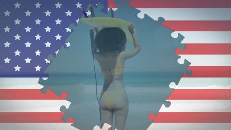 Animation-Von-Puzzles-Mit-Amerikanischer-Flagge,-Die-Eine-Frau-Zeigen,-Die-Am-Strand-Ein-Surfbrett-Auf-Dem-Kopf-Trägt