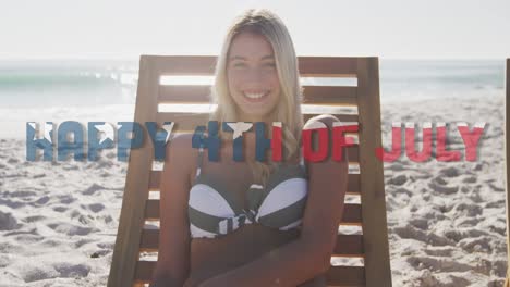 Animation-of-happy-4th-of-july-text-with-american-flag-pattern-over-smiling-woman-on-beach