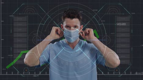 Animation-of-scope-scanning-and-green-line-processing-over-male-doctor-wearing-face-mask