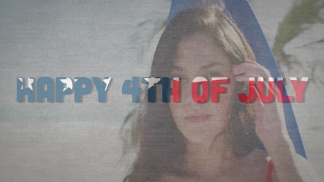 Animation-of-happy-4th-of-july-text-with-american-flag-pattern-over-woman-with-surfboard-on-beach