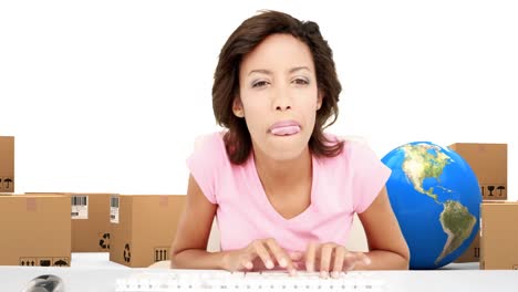 Animation-of-woman-typing-on-computer-keyboards-with-globe-stacks-of-boxes-on-white-background