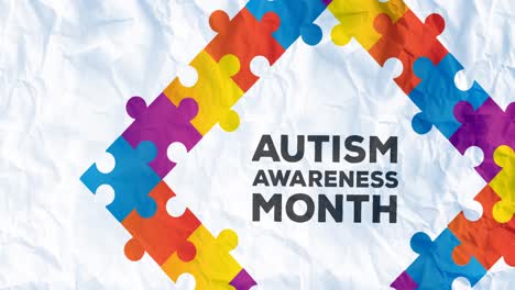 Animation-of-autism-awareness-month-in-frame-formed-with-autism-awareness-month-puzzles