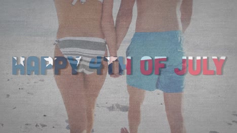 Independence-day-text-against-mid-section-of-caucasian-couple-holding-hands-and-walking-on-the-beach