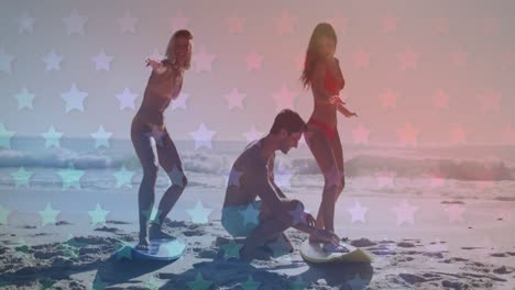 Multiple-blinking-stars-against-group-of-friends-practicing-surfing-at-the-beach