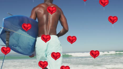 Animation-Digitaler-Herzsymbole-über-Einem-Mann,-Der-Ein-Surfbrett-Am-Strand-Trägt
