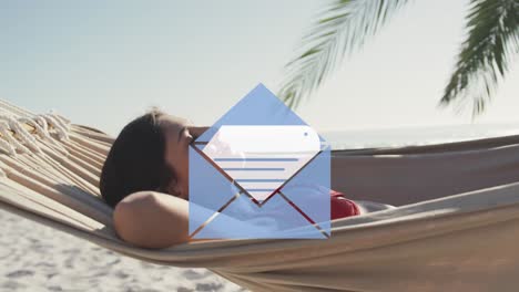 Animation-of-email-envelope-digital-icons-over-woman-lying-in-hammock-on-beach