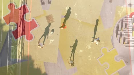 Animation-of-puzzles-falling-over-school-children-playing-football-in-background