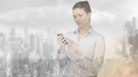 Animation-of-businesswoman-using-smartphone-over-cityscape