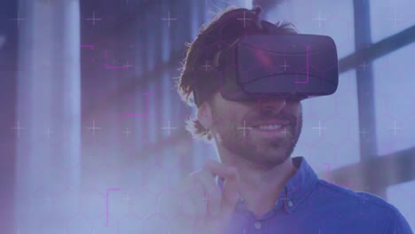 Light-trails-moving-against-caucasian-man-smiling-while-wearing-vr-headset-outdoors