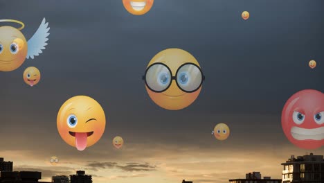 Animation-of-emoji-icons-flying-up-over-cityscape-at-sunset