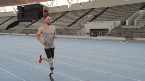 Caucasian-disabled-male-athlete-with-running-blade-training-and-running