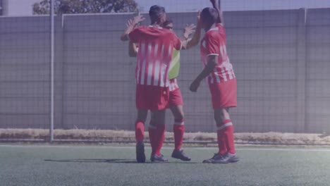 Round-scanner-and-network-of-connections-against-team-of-male-soccer-players-celebrating-a-goal