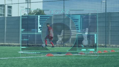 Animation-of-scope-scanning-over-male-football-player-playing-with-football-on-pitch