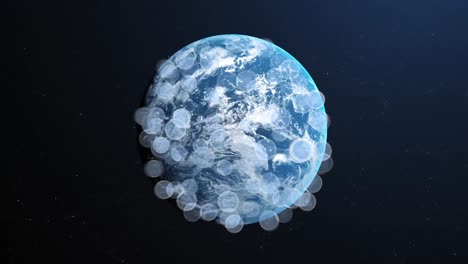 Globe-of-digital-icons-against-spinning-globe-on-blue-background