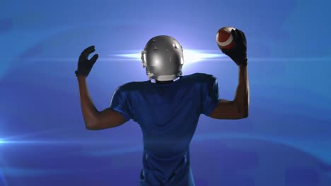 Animation-of-rear-view-of-excited-american-football-player-with-ball,-on-blue-with-pulsing-light
