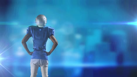 Animation-of-rear-view-of-waiting-american-football-player-on-blurred-blue-with-pulsing-light