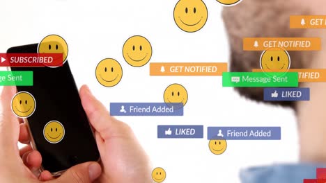 Animation-Von-Social-Media-Texten-Auf-Bannern-Mit-Emojis-über-Einem-Mann,-Der-Sein-Smartphone-Nutzt
