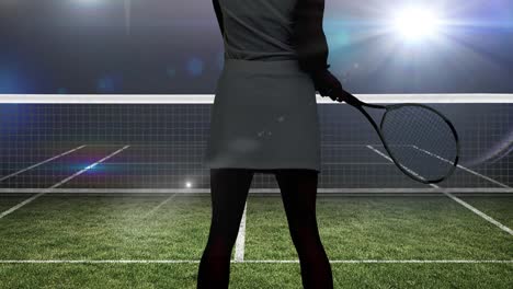 Animation-of-midsection-of-female-tennis-player-holding-racket-over-tennis-court