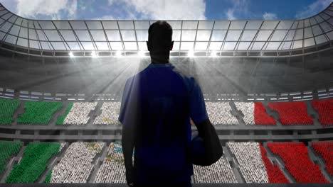 Animation-of-rear-view-of-football-player-holding-ball-over-mexican-flag-in-sports-stadium