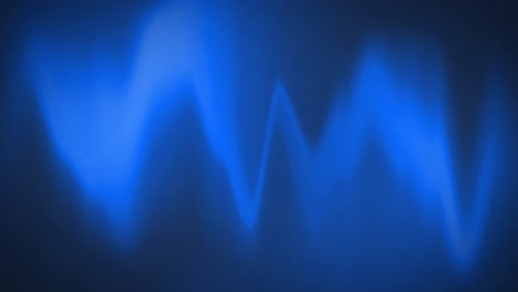 Digital-animation-of-blue-heart-rate-monitor-waves-on-black-background