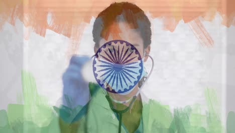 Zusammensetzung-Von-Covid-19-Zellen-Und-Ärztin-Mit-Gesichtsmaske-Und-Stethoskop-über-Indischer-Flagge