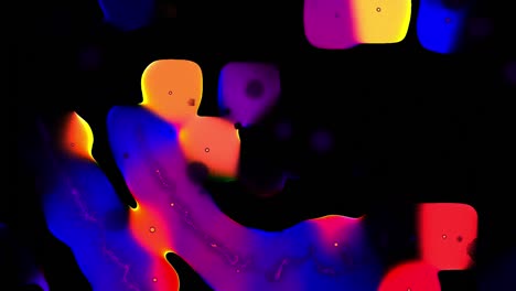 Animation-of-pulsating-yellow,-pink-and-blue-glowing-forms-moving-on-black-background