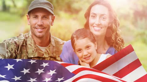 Animation-of-male-soldier-embracing-smiling-wife-and-daughter-over-american-flag
