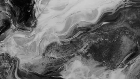 Animation-of-vibrant-coloured-grey-liquid-flowing-in-hypnotic-motion-on-black-background