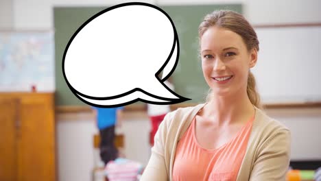 Animation-of-empty-white-speech-bubble-over-smiling-female-teacher-in-classroom