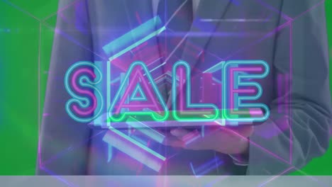 Animation-of-sale-text-and-glowing-neon-tunnel-with-businessman-using-tablet