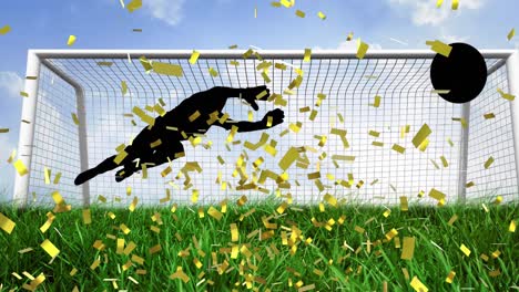 Golden-confetti-falling-over-silhouette-of-goalkeeper-making-a-save-on-football-field
