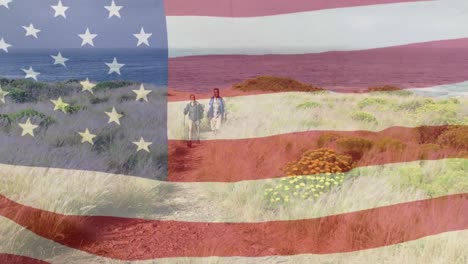 Animation-of-american-flag-moving-over-couple-hiking