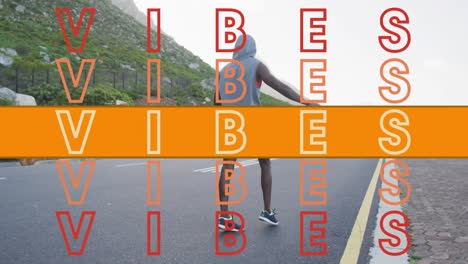 Animation-of-the-word-vibes-in-orange-over-man-exercising-on-mountain-road