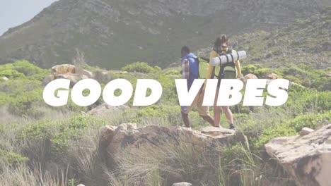 Animation-of-the-words-good-vibes-written-in-white-over-couple-hiking-in-mountains-drinking-water