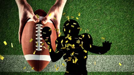 Animation-Von-Goldenem-Konfetti-über-Der-Silhouette-Eines-American-Football-Spielers-Und-Händen,-Die-Fußball-Halten
