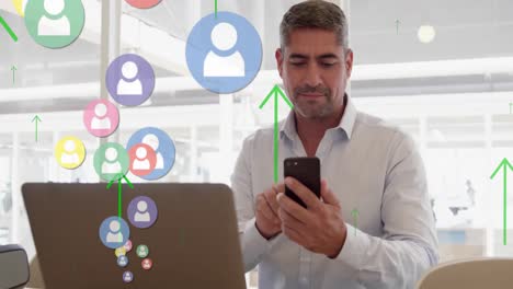 Profile-icons-and-arrows-moving-upwards-against-caucasian-senior-man-using-smartphone-at-office