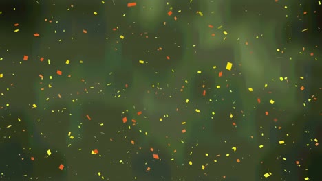 Animation-of-red-and-gold-confetti-falling-on-green-background